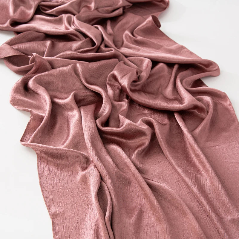 Women’s Solid Color Silk Satin Hijab Scarf – Smooth, Wrinkle-Textured Long Shawl

Crafted from luxurious silk-like satin, this hijab scarf features subtle bark-like wrinkles on one side and a smooth finish on the other. Its solid color design offers versa