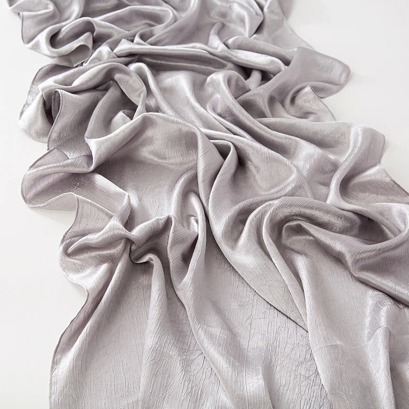 Women’s Solid Color Silk Satin Hijab Scarf – Smooth, Wrinkle-Textured Long Shawl

Crafted from luxurious silk-like satin, this hijab scarf features subtle bark-like wrinkles on one side and a smooth finish on the other. Its solid color design offers versa