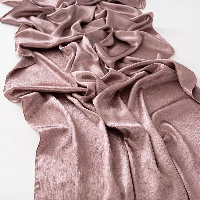 Women’s Solid Color Silk Satin Hijab Scarf – Smooth, Wrinkle-Textured Long Shawl

Crafted from luxurious silk-like satin, this hijab scarf features subtle bark-like wrinkles on one side and a smooth finish on the other. Its solid color design offers versa