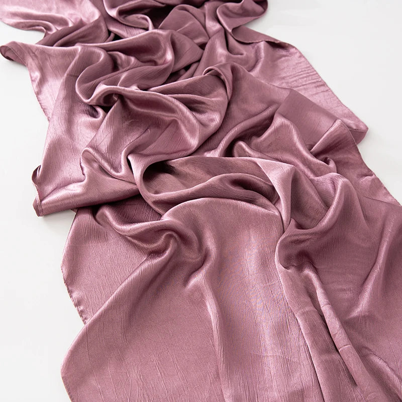 Women’s Solid Color Silk Satin Hijab Scarf – Smooth, Wrinkle-Textured Long Shawl

Crafted from luxurious silk-like satin, this hijab scarf features subtle bark-like wrinkles on one side and a smooth finish on the other. Its solid color design offers versa