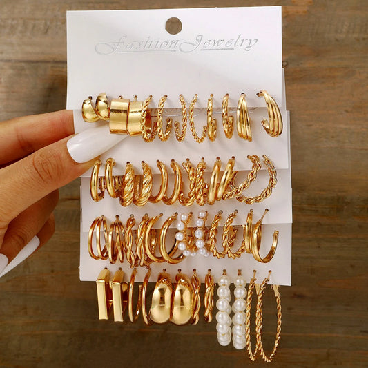 48-Piece Boho Hoop Earring Set for Women – Gold-Tone Vintage, Pearl, Heart, and Zircon Studs

This versatile earring set includes 48 pieces featuring large boho-style hoop earrings, vintage-inspired designs, pearl accents, heart shapes, and zircon studded