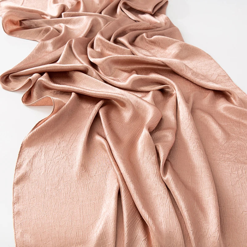 Women’s Solid Color Silk Satin Hijab Scarf – Smooth, Wrinkle-Textured Long Shawl

Crafted from luxurious silk-like satin, this hijab scarf features subtle bark-like wrinkles on one side and a smooth finish on the other. Its solid color design offers versa