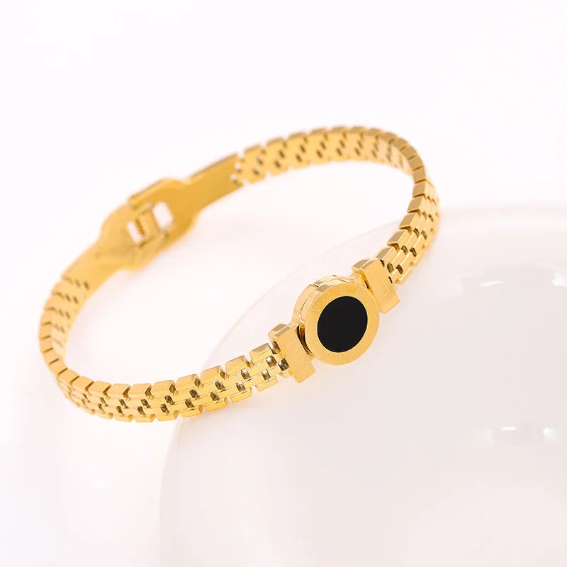 Elegant Gold-Plated Titanium Steel Bracelet with Zircon Inlay – Timeless Design for Everyday Wear

This beautifully crafted bracelet features durable titanium steel with a radiant gold-plated finish and delicate zircon inlays, offering a classic and minim