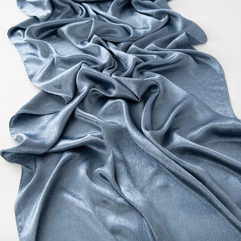 Women’s Solid Color Silk Satin Hijab Scarf – Smooth, Wrinkle-Textured Long Shawl

Crafted from luxurious silk-like satin, this hijab scarf features subtle bark-like wrinkles on one side and a smooth finish on the other. Its solid color design offers versa