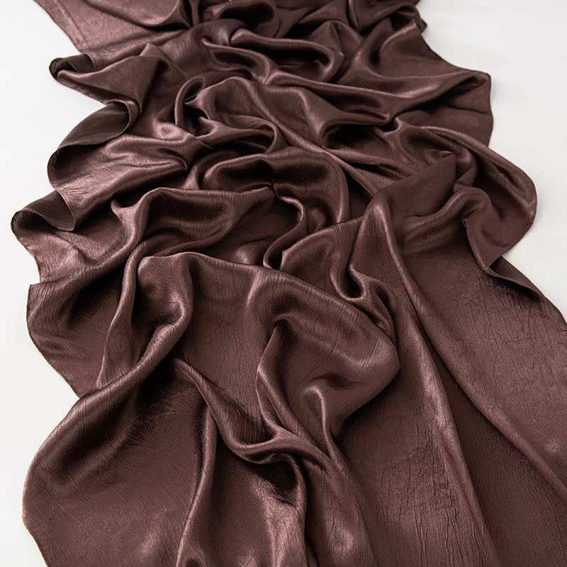 Women’s Solid Color Silk Satin Hijab Scarf – Smooth, Wrinkle-Textured Long Shawl

Crafted from luxurious silk-like satin, this hijab scarf features subtle bark-like wrinkles on one side and a smooth finish on the other. Its solid color design offers versa